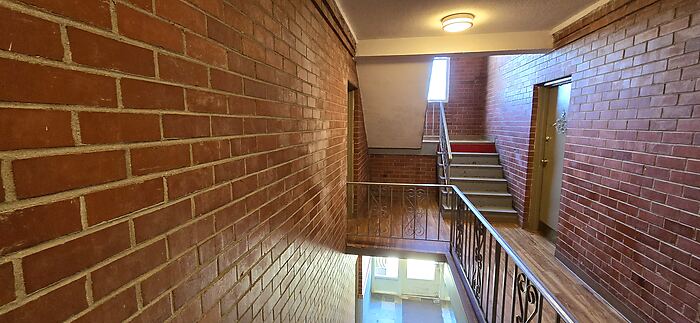 Interior brick stairwell and landing